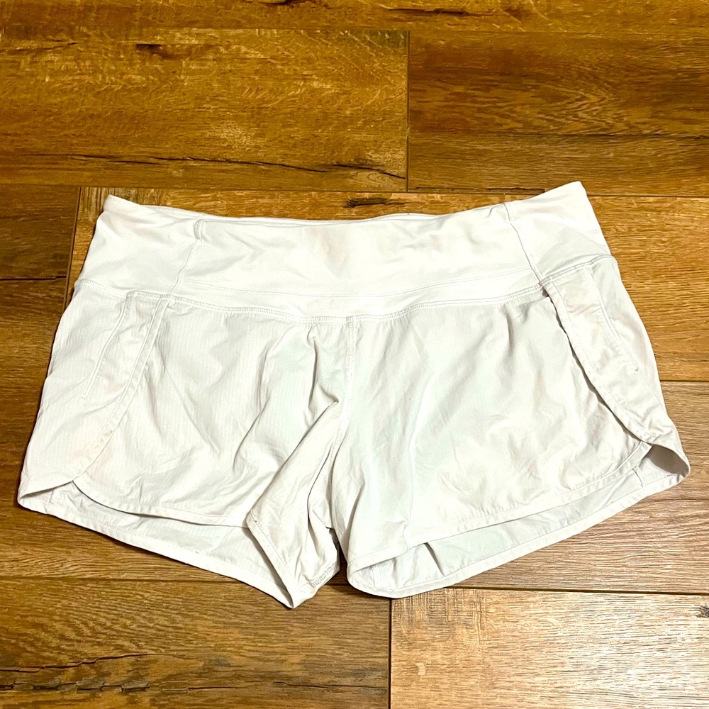 WHITE LULULEMON RUNNING SHORTS